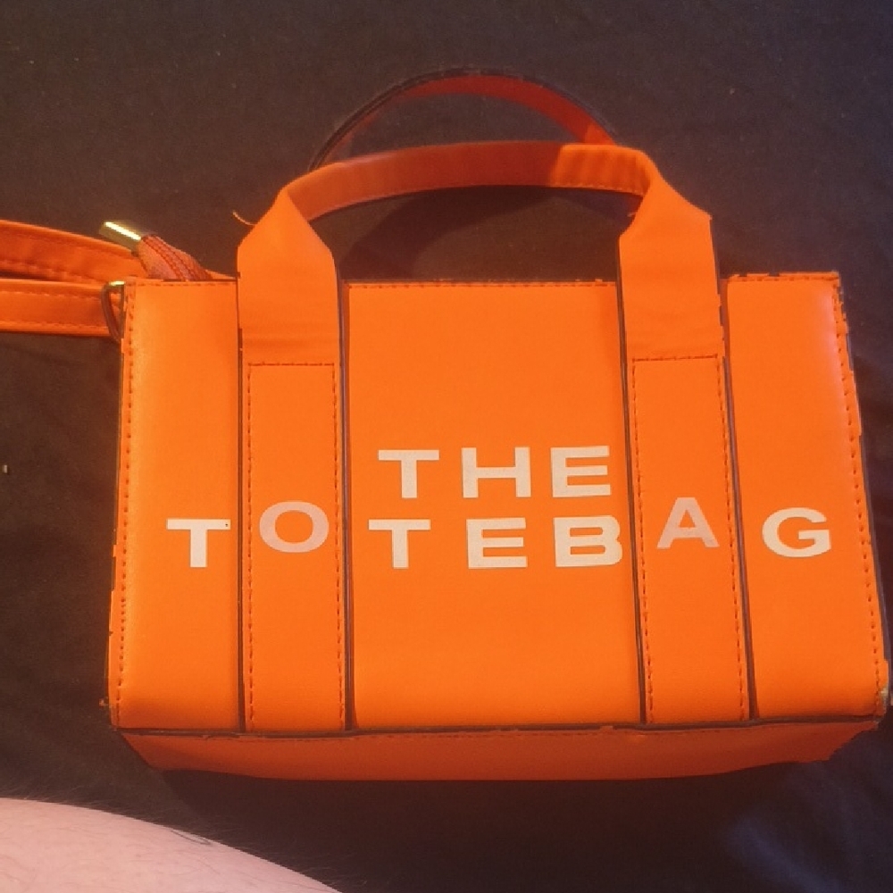 Toteme Orange Tote Bag with White Lettering
